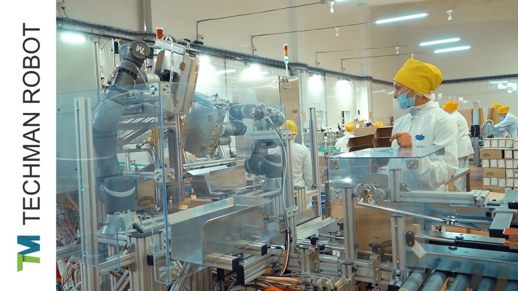 TM Robot food packaging and palletiziing at cheese factory