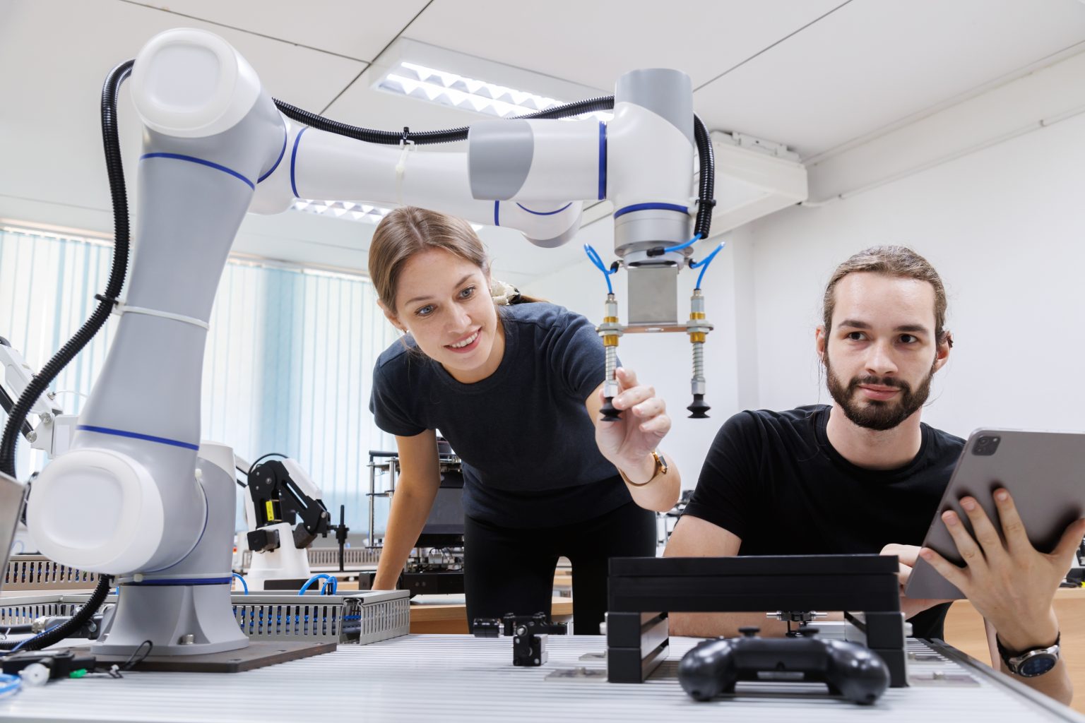 automation machine engineer students study and inspection control robot arm machine.